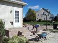 Jason, our VP setting Block for new porch steps and retaining wall enclosure!
